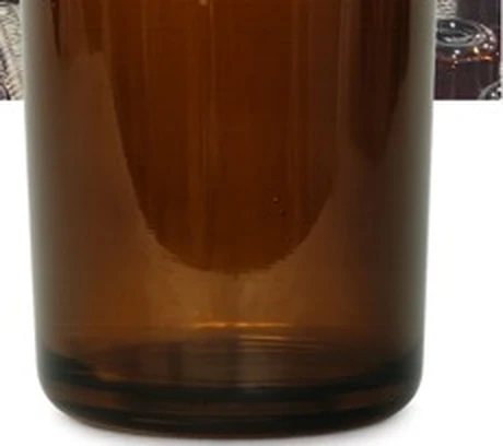 Finished amber glass candle tumbler