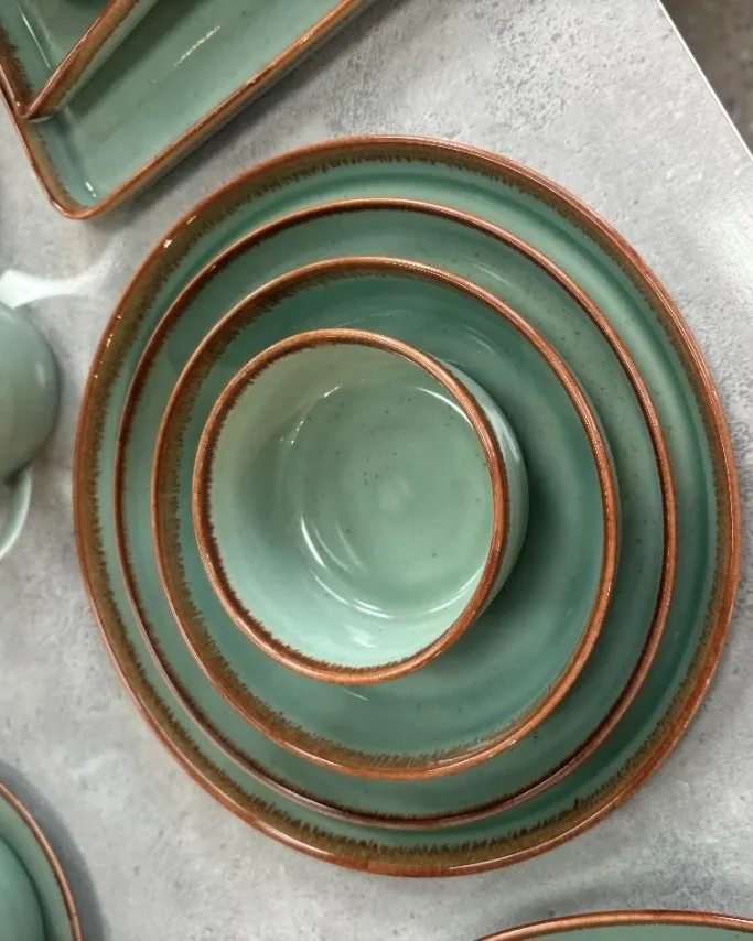 Green reactive-glaze stoneware dinnerware made in Vietnam