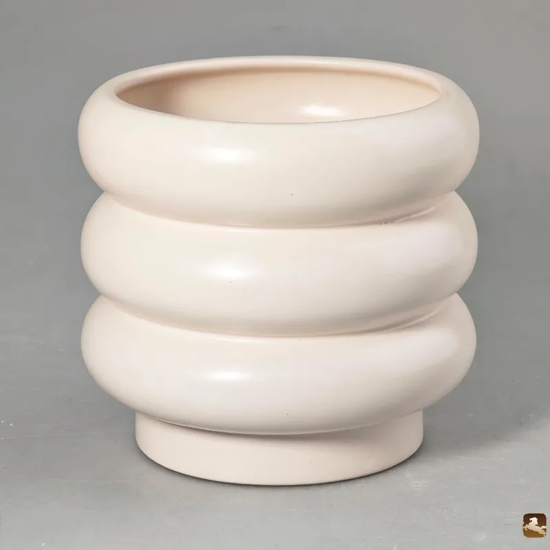 Stacked-ring white ceramic vessel