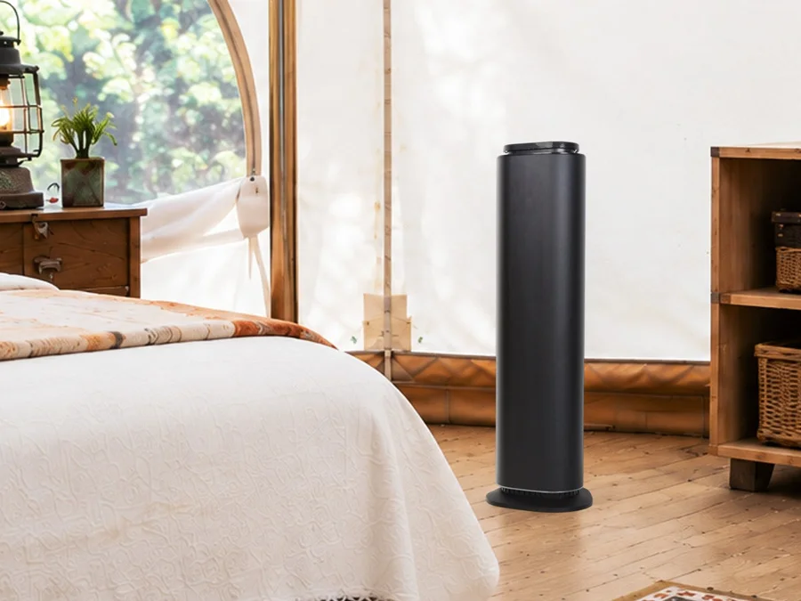 Black floor-standing scent diffuser in a guest room