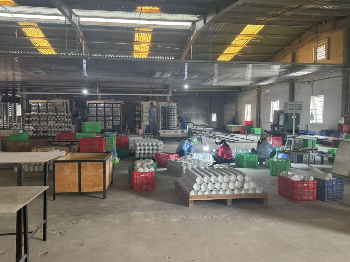 Ware being sorted and packed on a factory floor