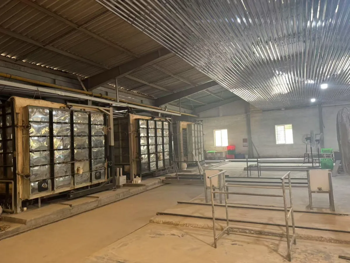 Shuttle kilns in a firing hall