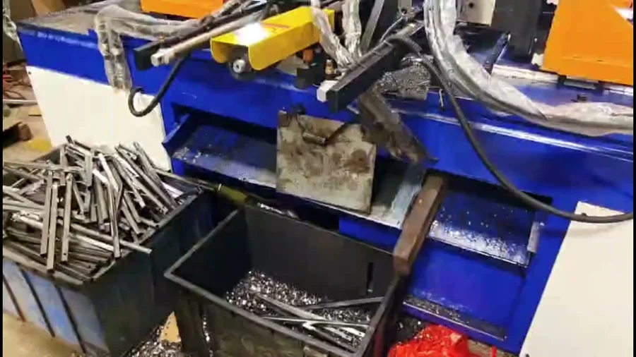 Automatic tube cutting machine with cut steel tubes
